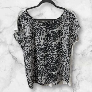 I Jeans By Buffalo black and white animal print cap sleeve shirt size large
